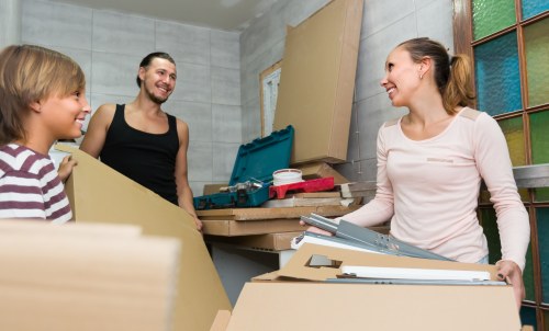 Furniture pick-up service removing a bulky sofa in Ruislip