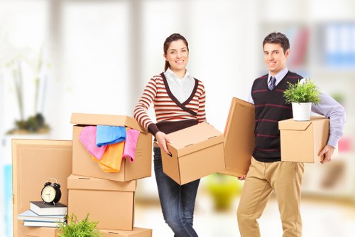 Professional movers loading items outside a Ruislip property