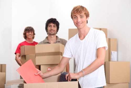 Moving day logistics with labelled boxes and furniture