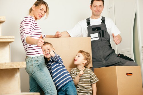 Local removals team packing and transporting boxes in Ruislip